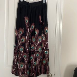 Skirt with feather design. Brand new.
